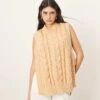 ARRANGE Cable Knit Sleeveless Jumper With Tie Detail In Apricot For Women -ARANG Clothing Shop 207319425 1 apricot