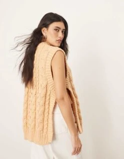 ARRANGE Cable Knit Sleeveless Jumper With Tie Detail In Apricot For Women -ARANG Clothing Shop 207319425 3