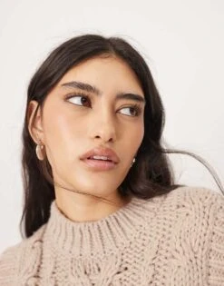 ARRANGE Cable Knit Sleeveless Jumper With Tie Detail In Oatmeal For Women -ARANG Clothing Shop 207375256 3