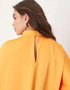 ARRANGE Curve High Neck Cape Sleeve Mini Dress With Asymmetric Hem In Bright Apricot For Women -ARANG Clothing Shop 207601524 4