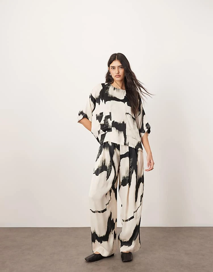 ARRANGE Satin Oversized T-shirt And Trouser Co-ord In Mono Abstract Print 6 ARRANGE Satin Oversized T-shirt And Trouser Co-ord In Mono Abstract Print - Image 4