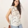 ARRANGE Cotton Cutwork Embroidered Top With Tie Side In Off White For Women -ARANG Clothing Shop 207646271 1 offwhite
