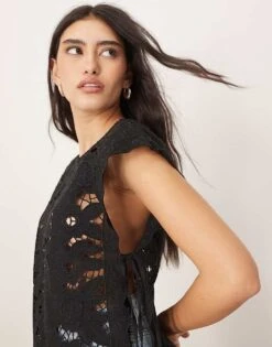 ARRANGE Cotton Cutwork Embroidered Top With Tie Side In Black For Women -ARANG Clothing Shop 207646371 3