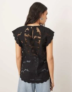 ARRANGE Cotton Cutwork Embroidered Top With Tie Side In Black For Women -ARANG Clothing Shop 207646371 4