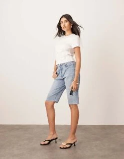 ARRANGE Cleo Denim Longline Short With Raw Hem In Mid Wash Blue For Women -ARANG Clothing Shop 207928921 1 midwashblue 1