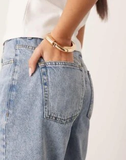 ARRANGE Cleo Denim Longline Short With Raw Hem In Mid Wash Blue For Women -ARANG Clothing Shop 207928921 5